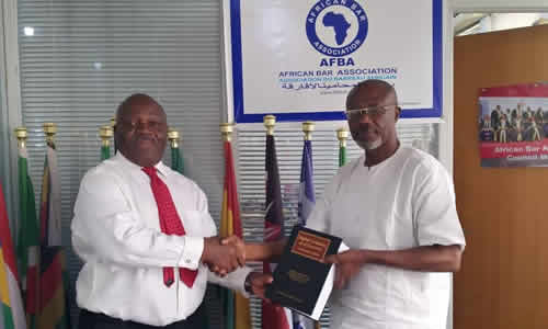 You are currently viewing Mr Emeka Arinze presents book to the AFBA President